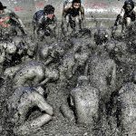 People play in the mud during the Boryeong Mud Festival at Daech