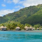 Luxury thatched roof honeymoon bungalows in French Polynesia