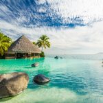 Infinity pool with palm tree rocks, Tahiti, French Polynesia