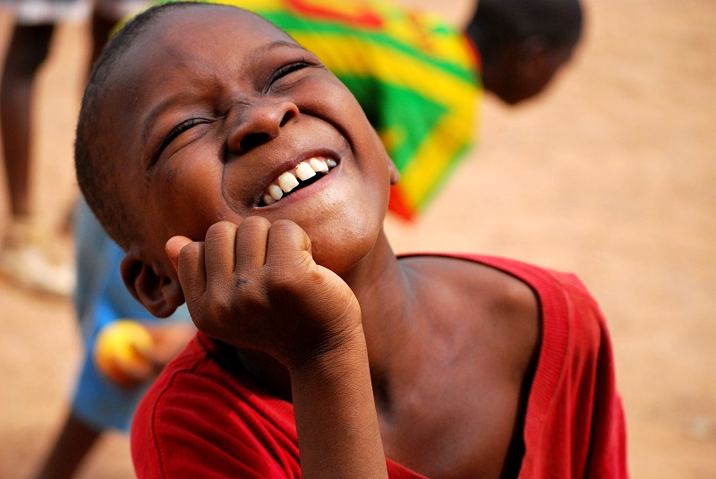 african-boy-smiling-and-having-fun-wearing-colorfu