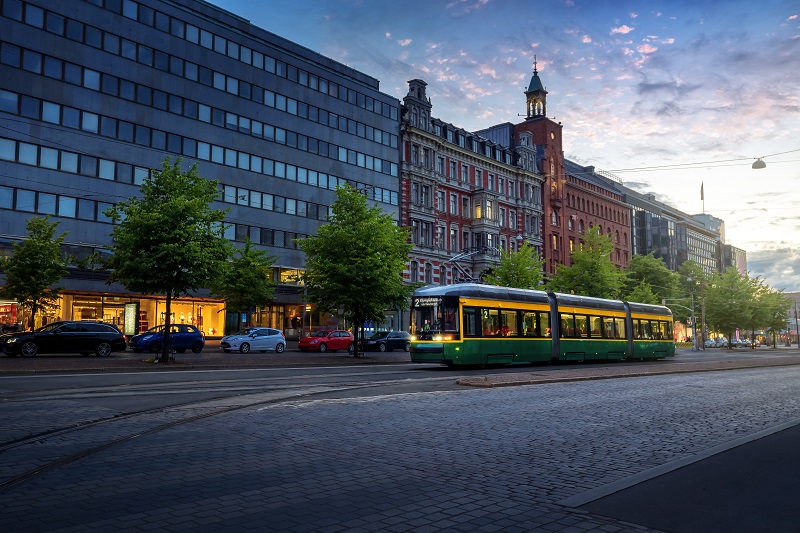 City Tram in Mannerheimintie Street at sunset - Helsinki main st