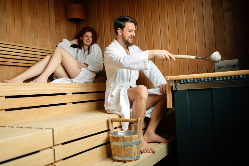 Couple enjoying finnish sauna