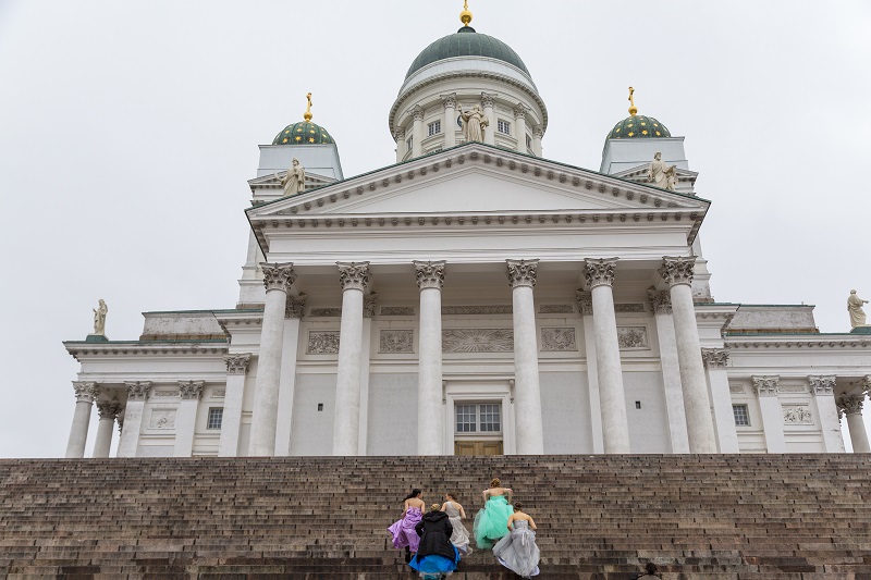 Helsinki,Finland,Women walking up the steps of the Lutheran Cathedral in Helsinki, Finland.