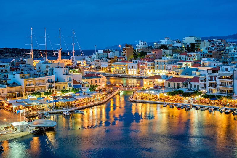 Beautiful Agios Nikolaos town at night. Lasithi region of Crete island, Greece