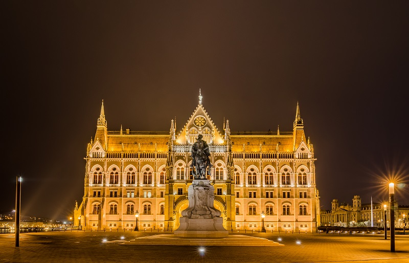 Night view of the Hungarian Parliament Building in Budapest, Hungary.